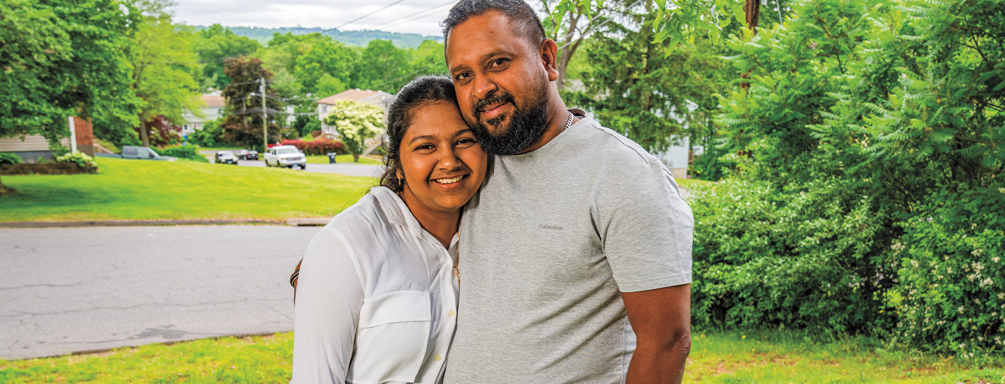 Photo of daughter and father posing together